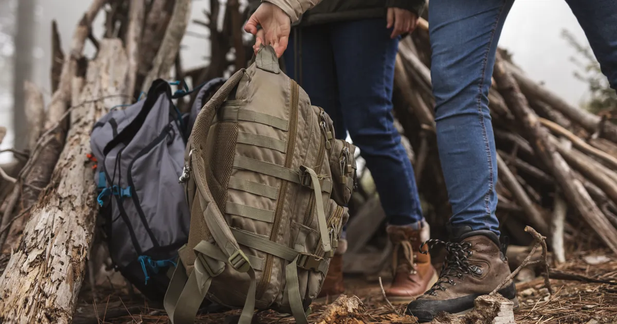 Emergency backpack packed for evacuation with essential supplies